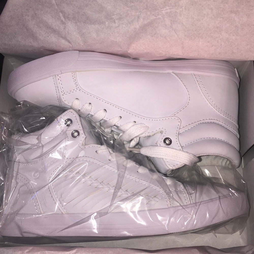 Selling high top guess sneakers ! Super cute and new ! Unfortunately didn’t fit.